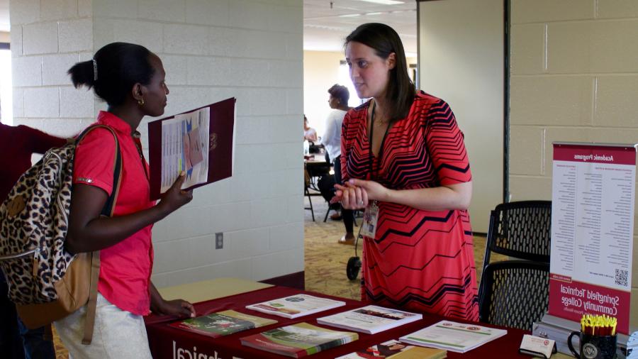 student asking question at open house